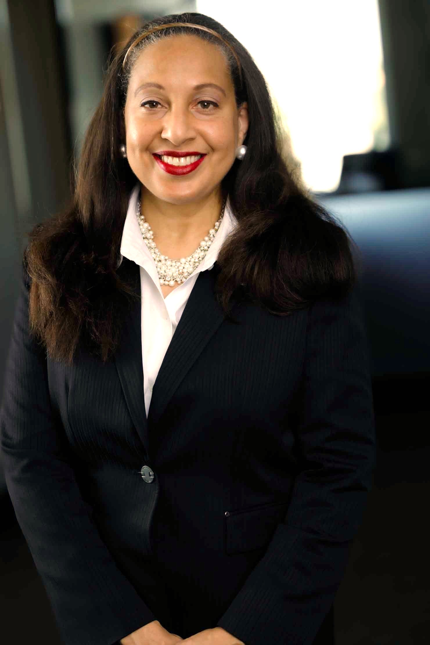 Ms. Denise E. Peart